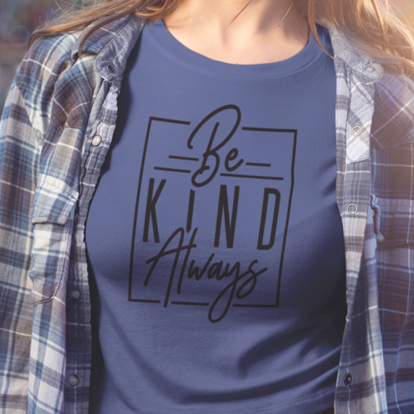 The t-shirt design says "Be Kind Always" with the three words stacked on top of each other. "Be" and "Always" are in a hand-written font while "Kind" (in the Middle) is a strong block font. The text is black and comes on one of four colors for the t-shirts - mint, mauve, blue, tan or white.